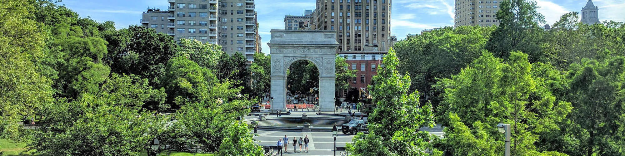 View of Washington Square Park from the south towards the fountain and arch